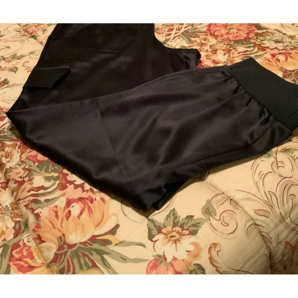 Adorable black satin cargo pants by Lori Goldstein.